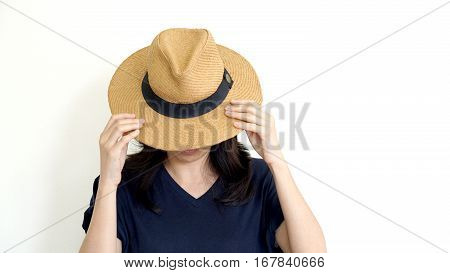 Asian Woman Hide Face Behind Hat. Introvert And Antisocial Concept