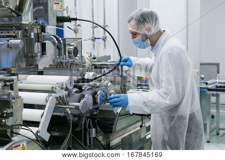 Scientist Work With Manufacture Machine