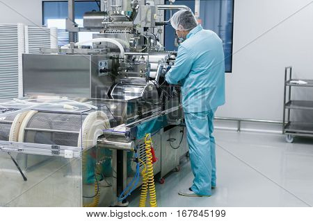 Scientist Fix Machine With Shafts