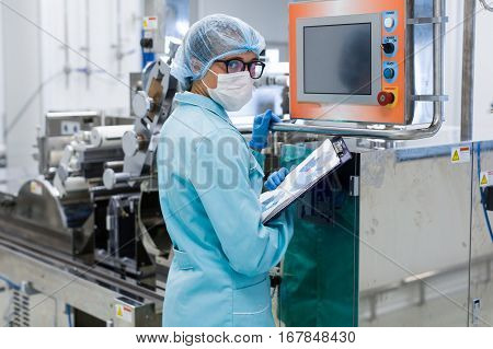 Factory Worker Work With Control Panel