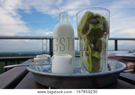 Green tea milk ice  background of the sky