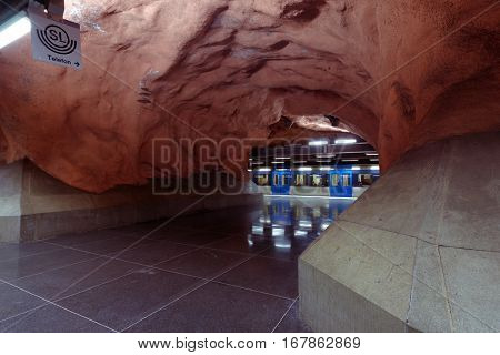 STOCKHOLM, SWEDEN - DECEMBER 26, 2016: Interior of Radhuset subway station. Over 90 subway stations have been decorated with sculptures, mosaics, paintings and reliefs by over 150 artists