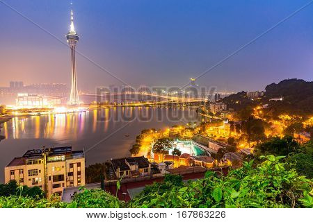 Macau Tower woth urban ladscape, Macao China at night