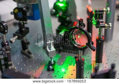 the study of lasers on the test bench in the science lab optical testing