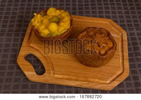 Game Pie Served With Bowl Of Piccalilli