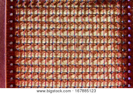 Close up of old computer magnetic core memory storage. 256 bits using iron ferrous rings.