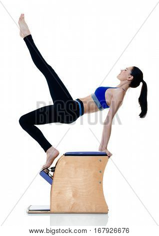 one caucasian woman exercising fitness pilates exercices isolated on white background