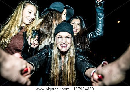 Four girls making party outdoor in the night