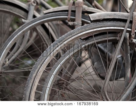 ABSTRACT SHOT OF OLD RUSTY BICYCLE PARTS