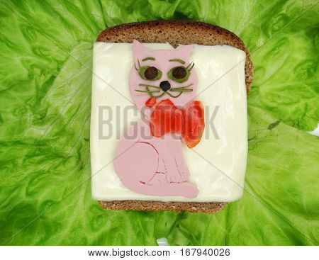 creative sandwich with cheese and salame cat shape