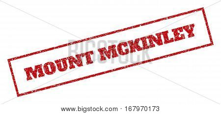Red rubber seal stamp with Mount Mckinley text. Vector tag inside rectangular banner. Grunge design and dust texture for watermark labels. Inclined sign.