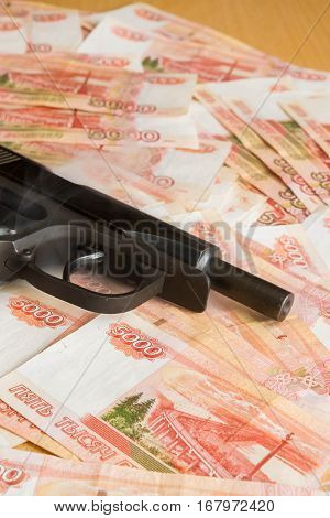Black Gun Lies On The Russian Big Money