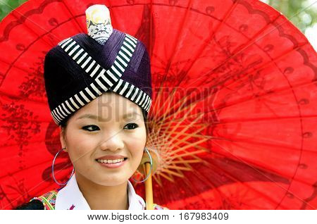 BAN LAK HA LAOS - DECEMBER 18: Woman in the traditional dress of Homong ehtnic minority people of Laos on December 18 2010