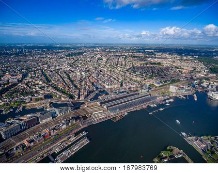 City aerial view over Amsterdam, The Netherlands. View from the bird's flight