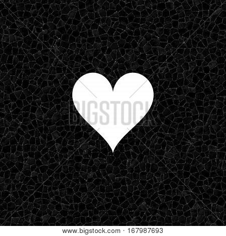 Black and white heart symbol cut in dark mosaic stony surface