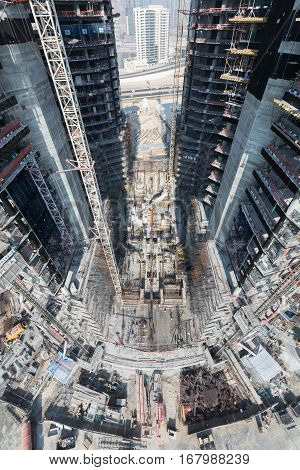 United Arab Emirates, Dubai, 05/21/2015, Damac Towers Dubai by Paramount, construction and building ariel views with cityscape background