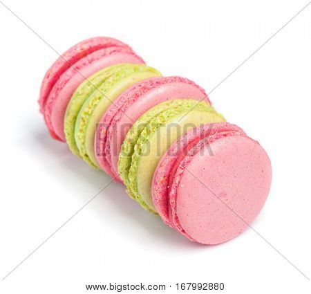 Tasty macaroons in two colors isolated on white background