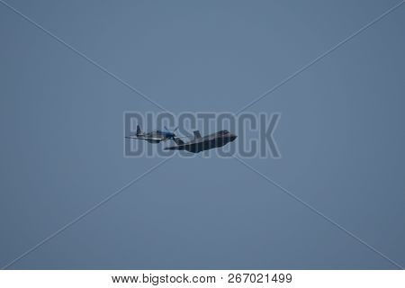North American P-51 Mustang And Lockheed Martin F-35 Lightning Ii Flying Side By Side In A Heritage 