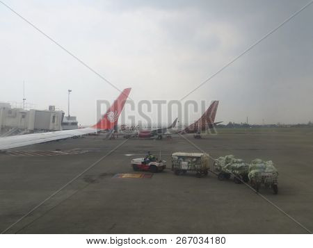 Jakarta, Indonesia - October 28, 2018: Freight Train Containing Baggage Of Aircraft Passengers Are R