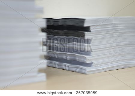 Pile Of Unfinished Documents On Office Desk Folders. Business Papers Or Document Is Written. Busines