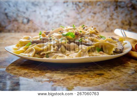 Goat Cheese Mushroom Stroganoff With Chopped Walnuts