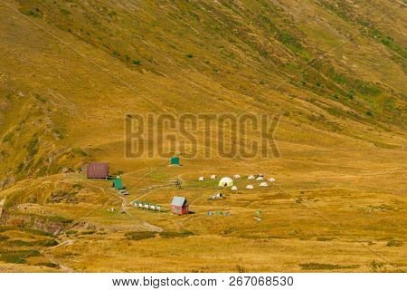 Tourist Camp On The Autumn Mountain Plateau On The Psekhako Ridge