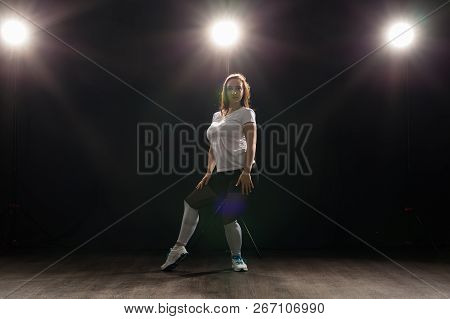 Hip-hop, Jazz-funk, Tecktonik, Waacking, Trance And Street Dances Concept - Young Woman Dancing Jazz