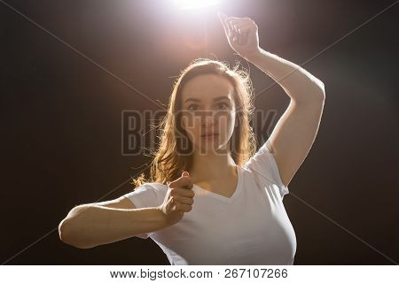 Hip-hop, Jazz-funk, Tecktonik, Waacking, Trance And Street Dances Concept - Young Woman Dancing Jazz