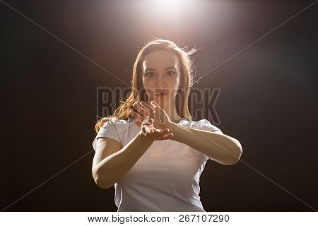 Hip-hop, Jazz-funk, Tecktonik, Waacking, Trance And Street Dances Concept - Young Woman Dancing Jazz