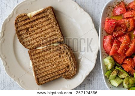 Turkish Toast (tost) With Melted Cheese, Tomatoes And Cucumber.