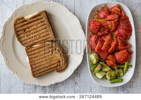 Turkish Toast (tost) With Melted Cheese, Tomatoes And Cucumber.