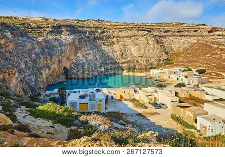 The Top Of The Rocky Cliff Is The Best Place To Overlook The Small San Lawrenz Fishing Village, Loca