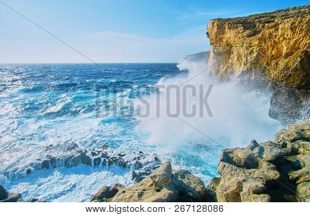 Tall Cliffs Of San Lawrenz Coast Are Perfect To Observe The Storm With High And Strong Waves, Crashi