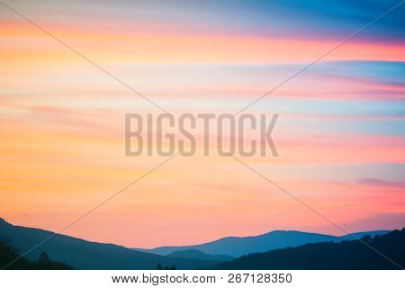 Fire Sunset At Mountains. Sky And Clouds Texture