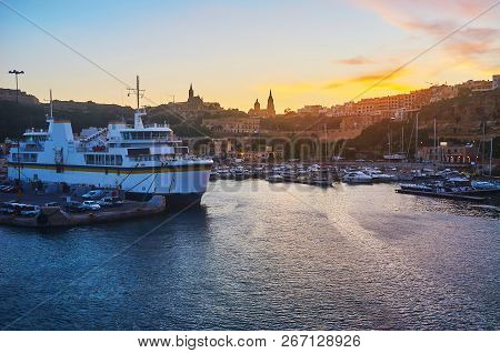 Enjoy The Sunset Over Ghajnsielem From The Sea With A V Iew On City Hills, Mgarr Harbour And Ferry, 