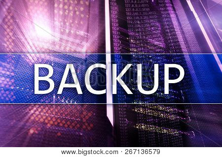 Backup Button On Modern Server Room Background. Data Loss Prevention. System Recovery.