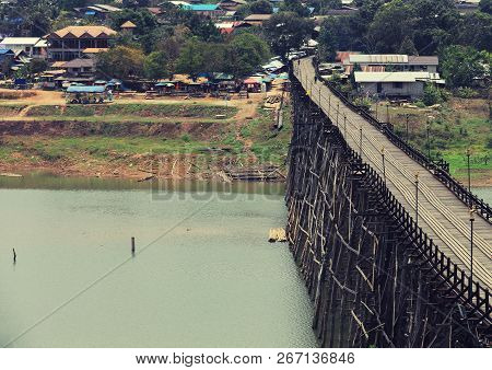 Landmark Old Wooden Bridge , Mon Bridge At Sangklaburi, Kanjanaburi , Thailand. One Of The Most Famo