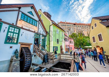 Krumlov, Czech Republic - 21 September 2018: View of Cesky Krumlov narrow street with beautiful ancient arcitecture and tourists