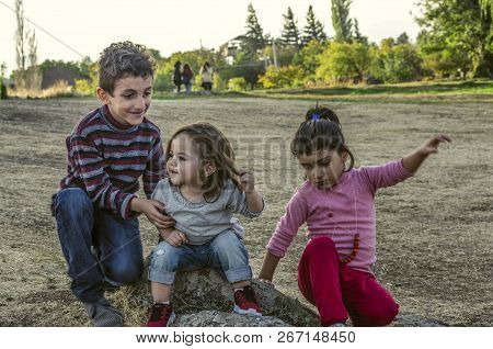 Ashtarak,armenia,10 September,2018: Little Boy And Two Little Girls Met And Became Friends In The Co