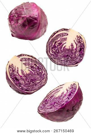 Creative Flying Vegeteable. Red Cabbage Slices Flying Isolated On White Background. Clipping Path. L