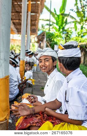 Bali, Indonesia - October 9, 2018: Balinese Boy In Traditional Clothes On Culture Ceremony, Ubud, Gi