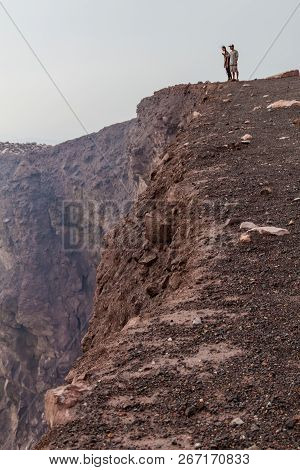 Telica, Nicargaua - April 26, 2016: Tourists At The Rim Of Telica Volcano Crater, Nicaragua