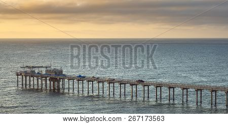 Scripps Pier And Horizon At Sunset In San Diego