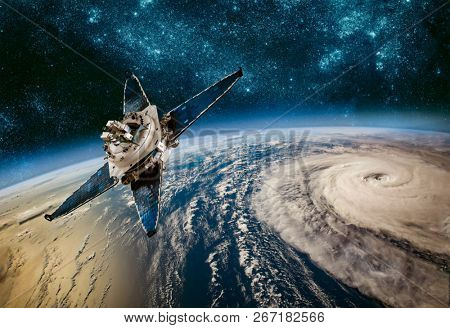 Space satellite monitoring from earth orbit weather from space, hurricane, Typhoon on planet earth. Elements of this image furnished by NASA.