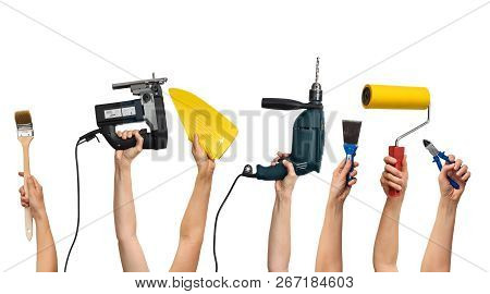 Set Of The Tools For Home Repair In Human Hands, On White Background