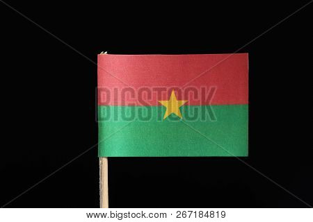 A Official And Original Flag Of Burkina Faso On Toothpick On Black Background. Consists From Two Hor