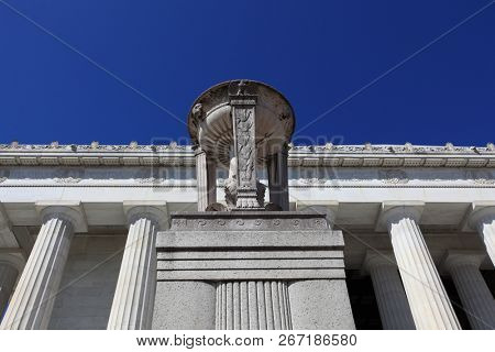 The Frieze with the names of states and the dates separated by double wreath medallions, and the cornice with lions' heads and ornamented palmetto, in basrelief on top of the Lincoln Memorial