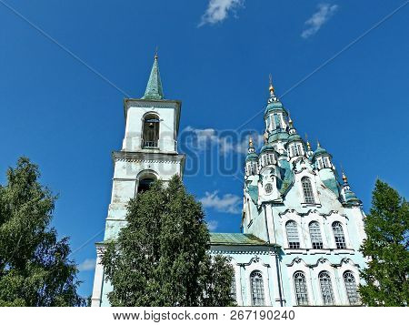 Transfiguration Church (construction 1794-1823) Against The Blue Sky. Village Nizhnyaya Sinyachikha