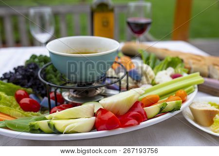 Traditional Italian Dish - Bagna Cauda. Hot Sauce And Raw Vegetables.