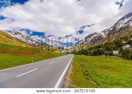 Road Amoung Snowy Alps Mountains, Fluelapass, Davos,  Graubuenden Switzerland